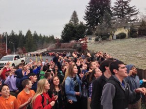 Catholic high school students protest the dismissal of a popular gay vice-principal near Seattle