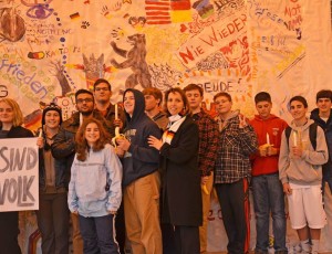 Woodgrove German teacher, Effie Hall (center), with students “protesting” the Berlin Wall