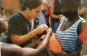 Stephanie administering a polio vaccine