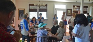 Kristen K. Swanson (left of center) convenes her Saturday organizing meeting