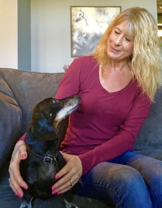 Erin Palmer, with Neo, their dachshund